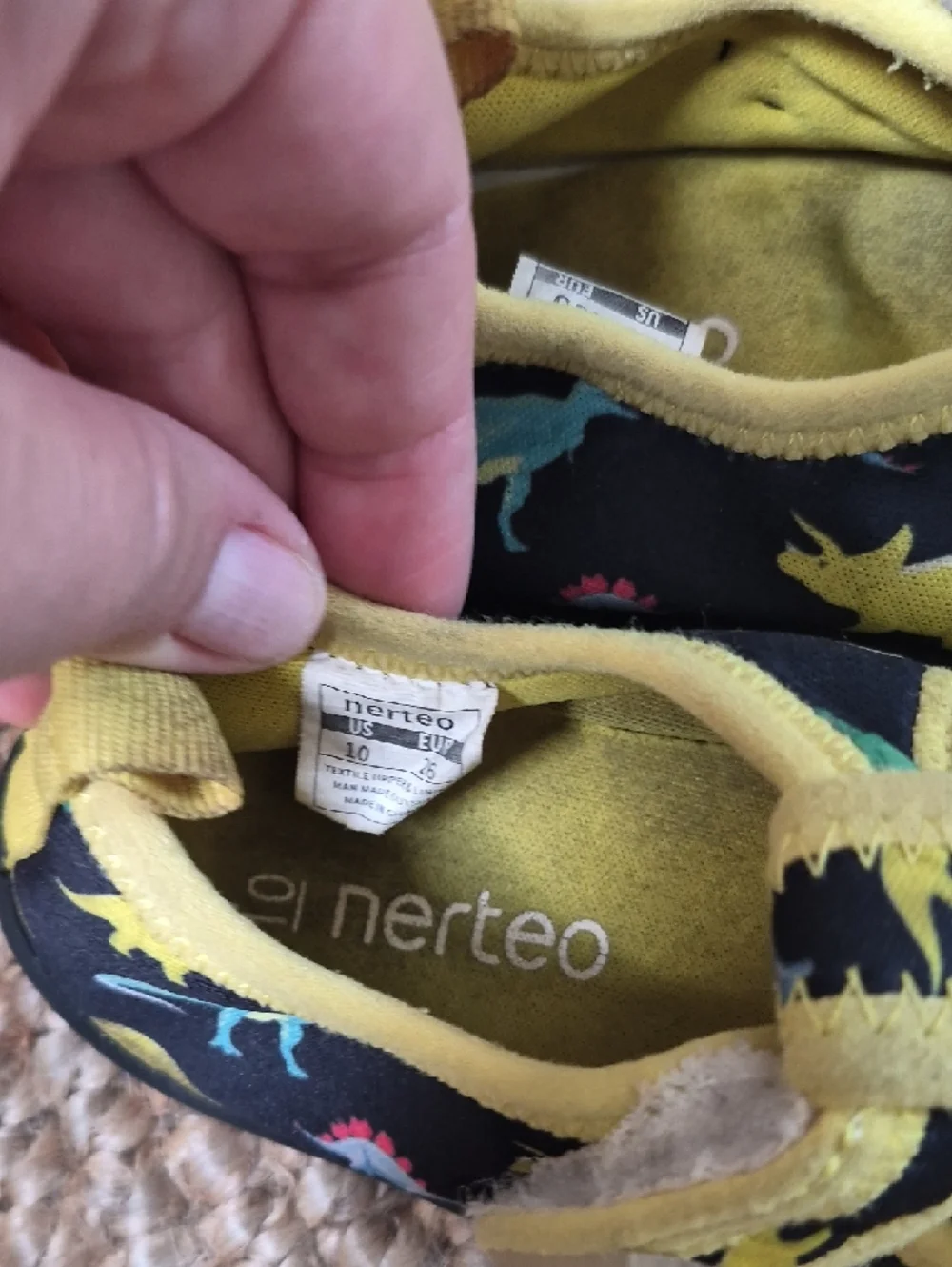 Toddler's dinosaur print water shoes are from the brand Nerteo. 10 Water Shoes
